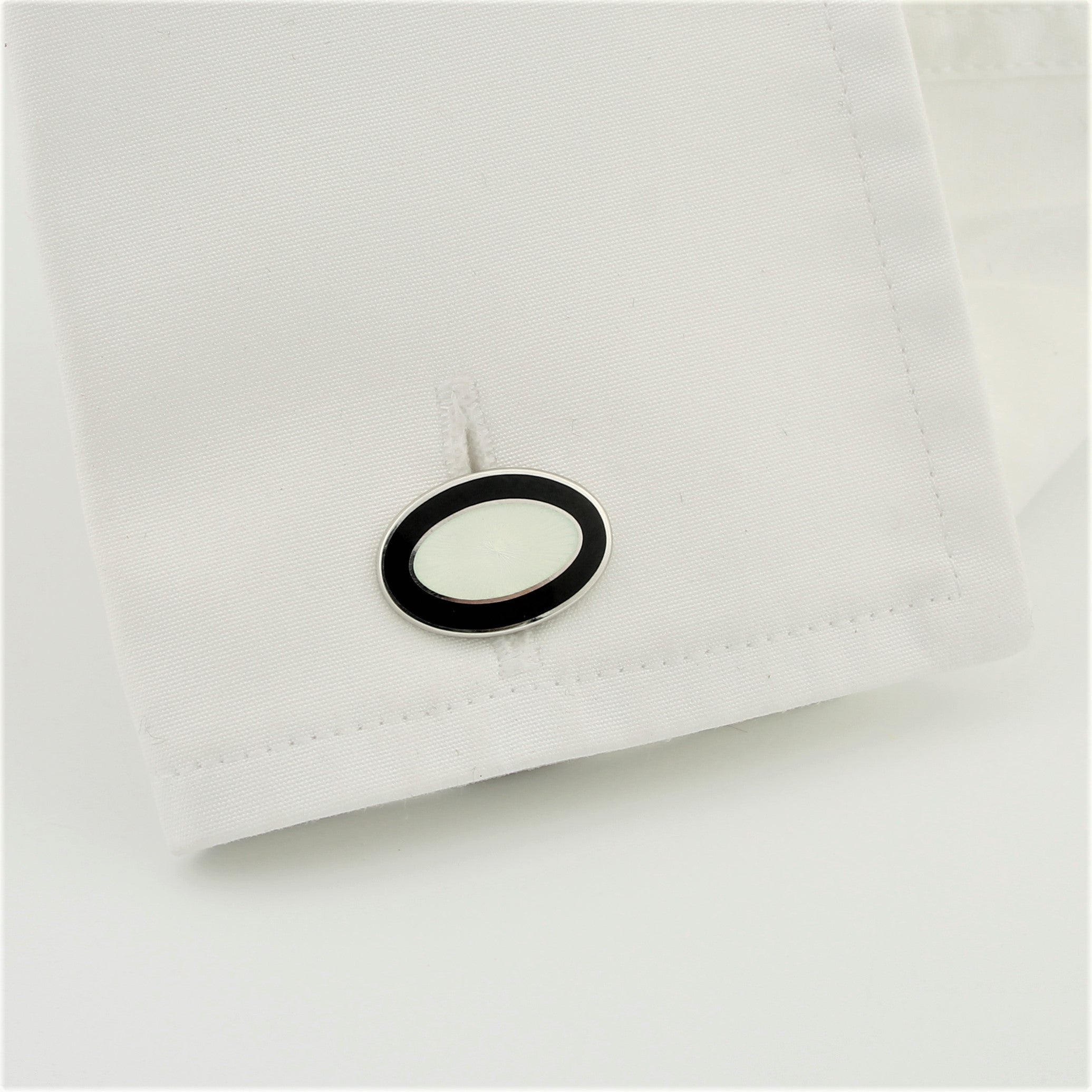 Double Oval Black and White enamel on Sterling silver in a cuff