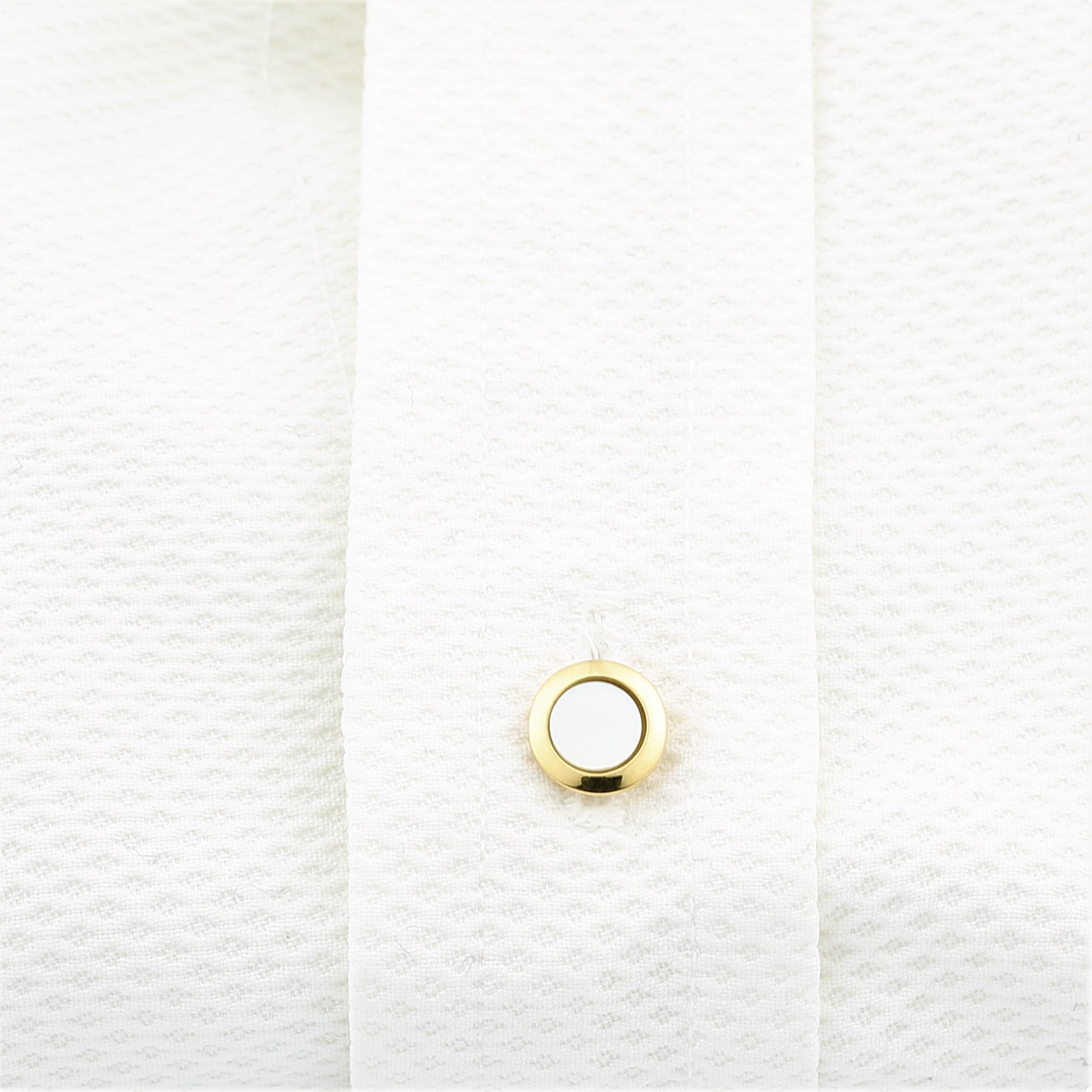 Mother of pearl studs 18k yellow gold in a shirt