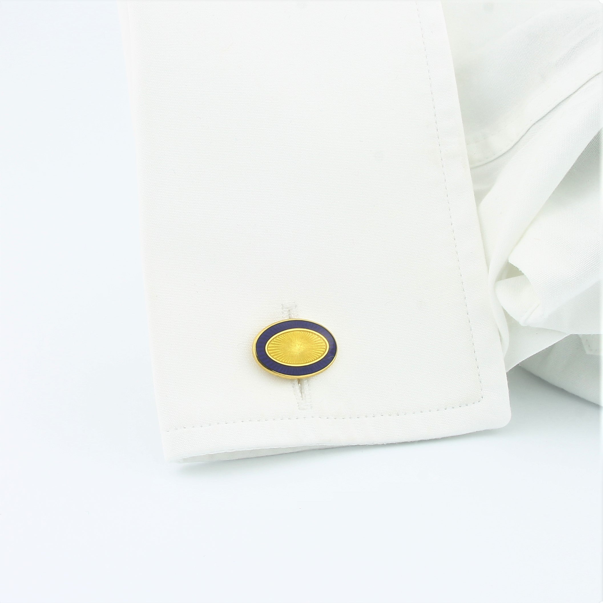 Double Oval blue yellow enamel cufflinks 18k yellow gold in a cuff