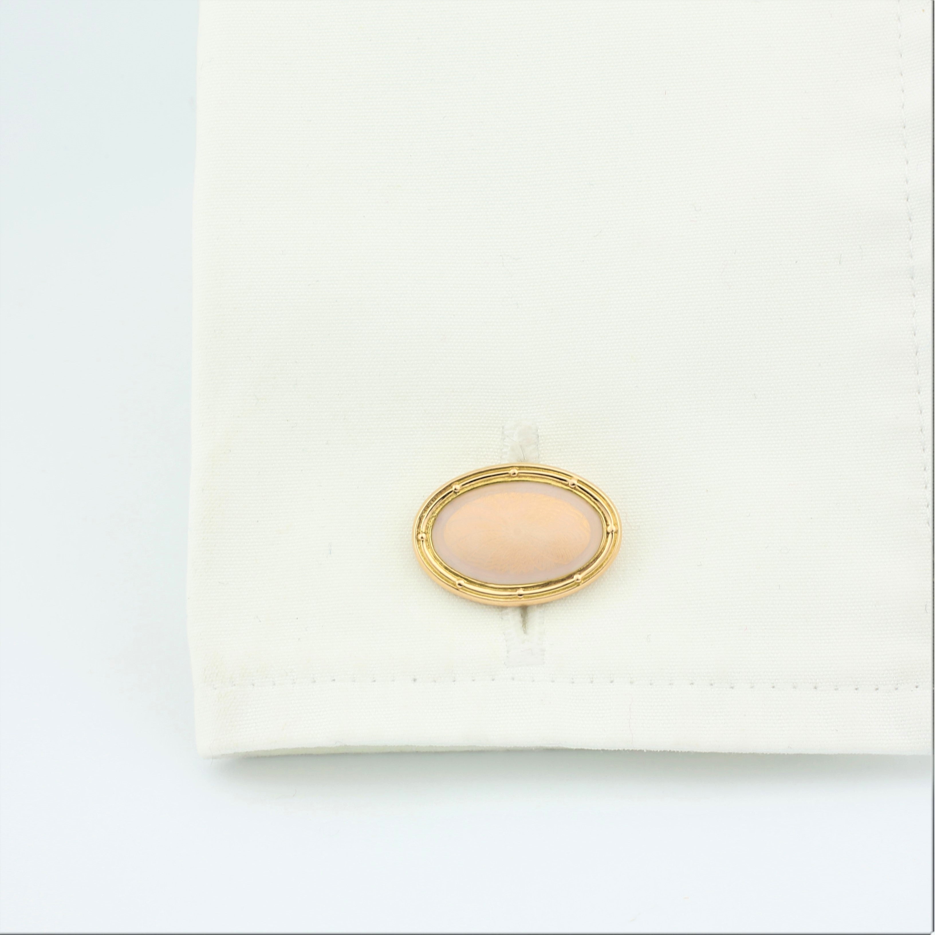 Spiral cream enamel in 18k rose gold in a cuff