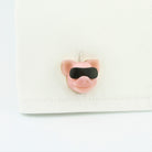 Cool pig cufflinks in 18k rose gold in a cuff