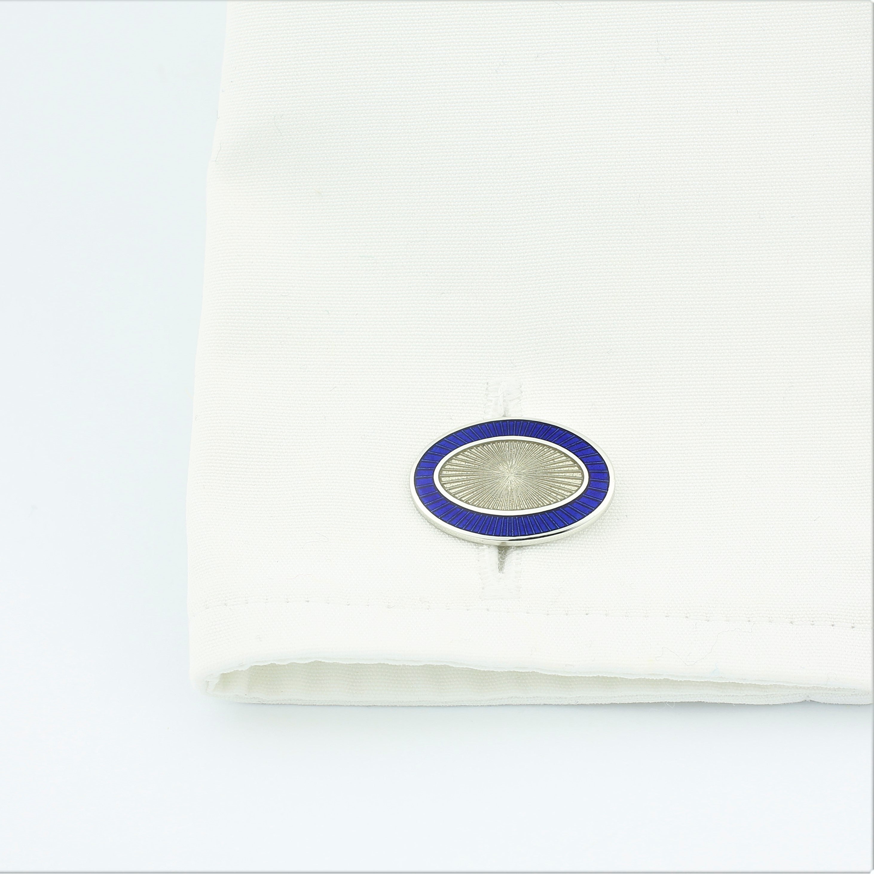 Double Oval Blue/Trans enamel cufflinks in 18k white gold in a cuff