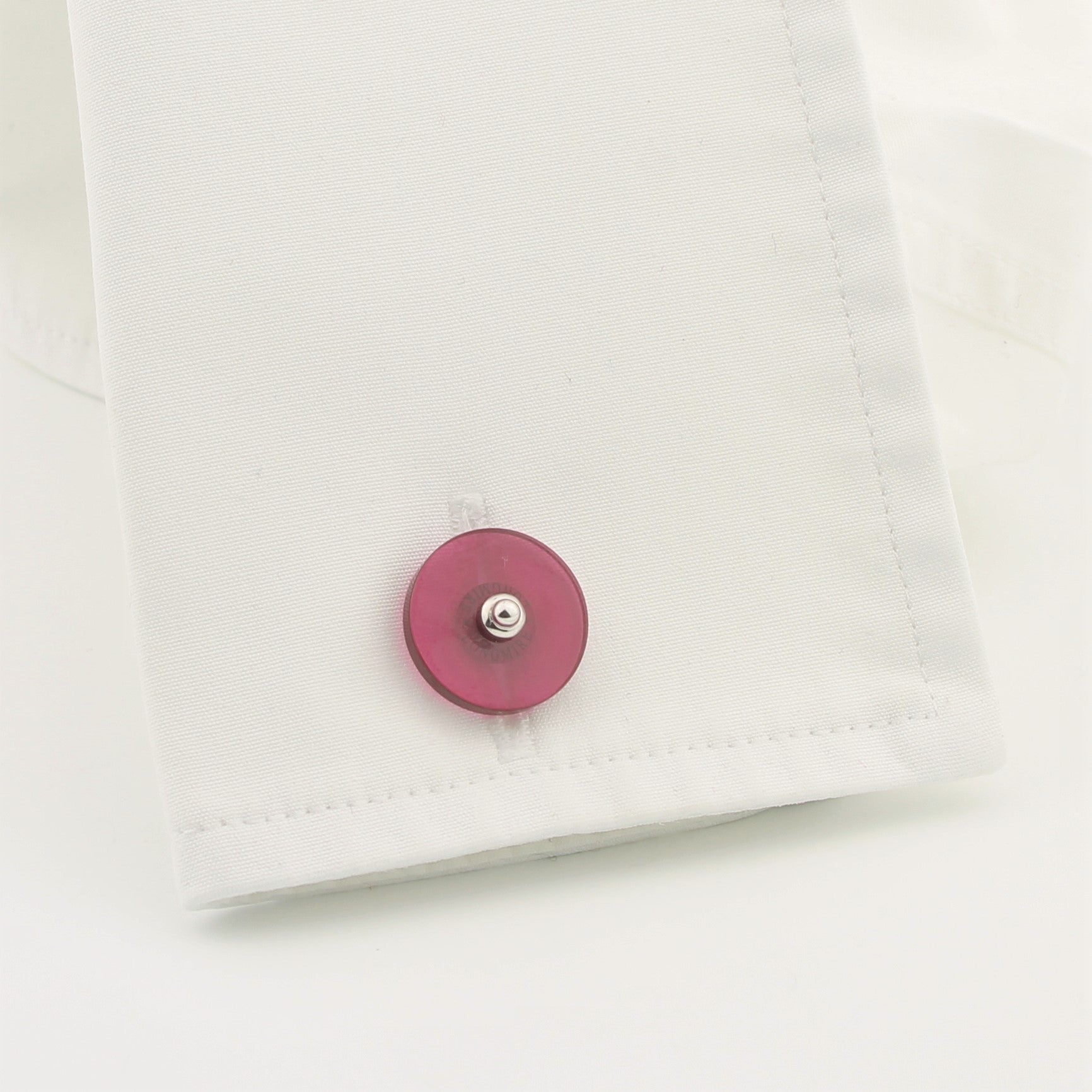 Ruby disc cufflinks 18k white gold in a cuff