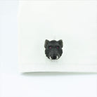 Boar's head cufflinks in obsidian and 18k white gold in a cuff