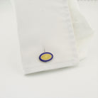 Double oval cufflinks blue and yellow in sterling silver in a cuff