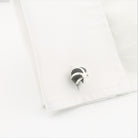 Twister design cufflinks in sterling silver in a cuff