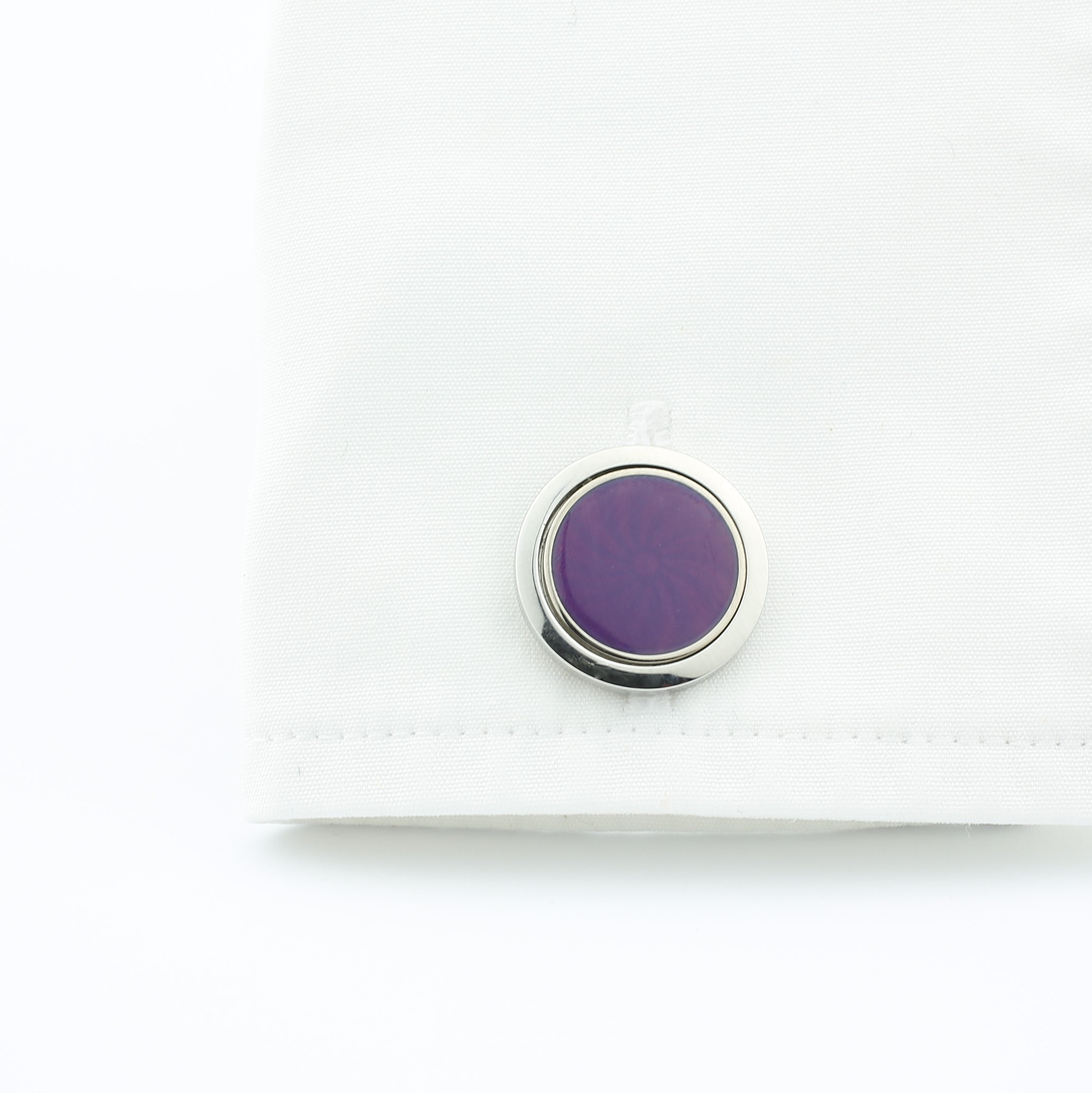Astral purple enamel cufflinks in steel in a cuff