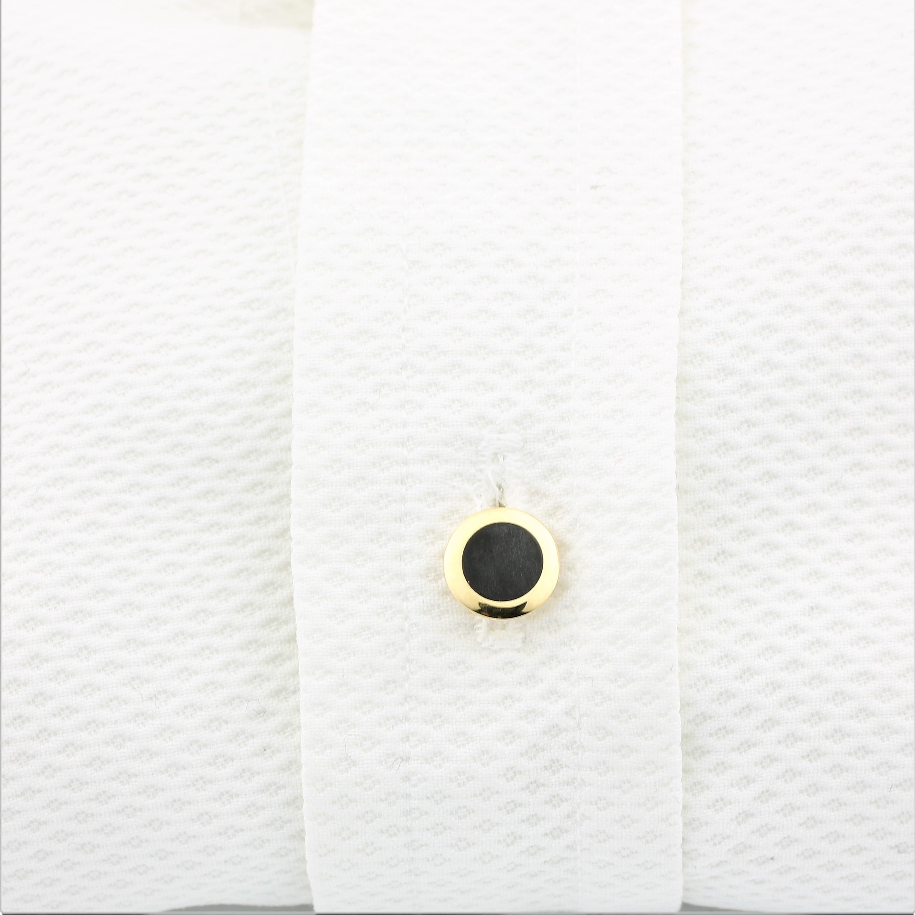 Onyx studs in 18k yellow gold in a shirt